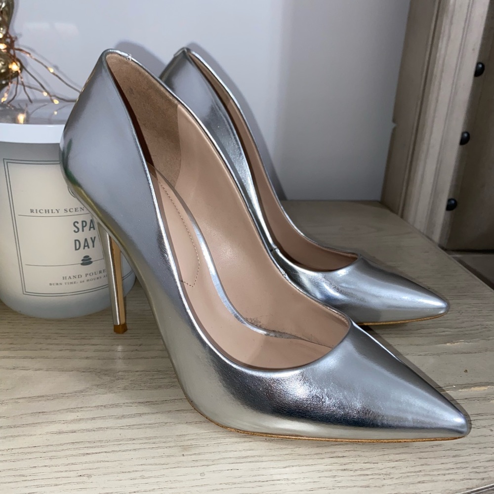 Silver ALDO pumps!